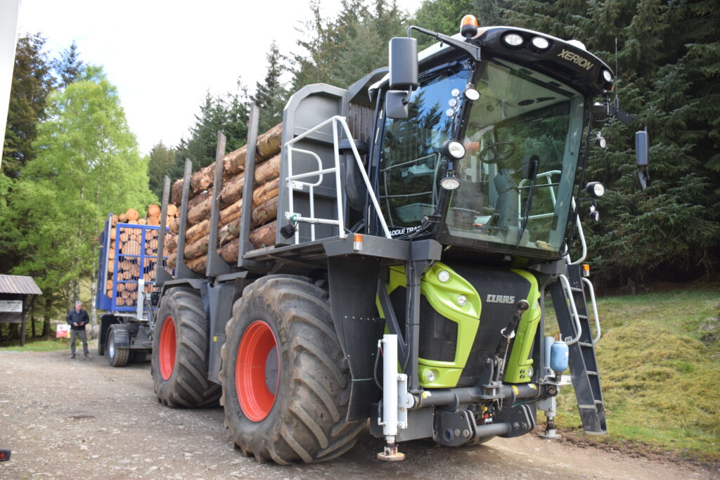 Scottish Forestry - Claas Xerion Saddle Trac converted into a timber carrier with a KESLA 2012T loader and cabin with a low ground pressure trailer