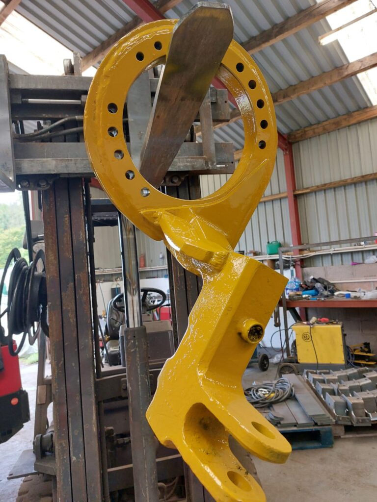 Repaired feed roller arm