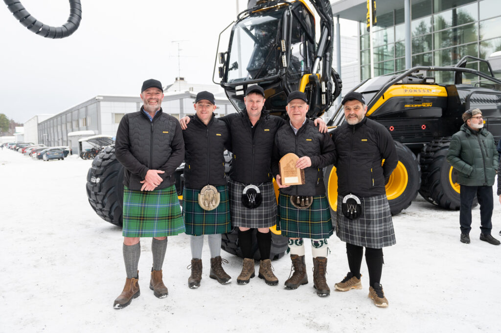 the 19,000th PONSSE forest machine was handed over to Scottish long-term customer Elliot Henderson Ltd, with the Royal Burgh of Annan Pipe Band playing in the background. 