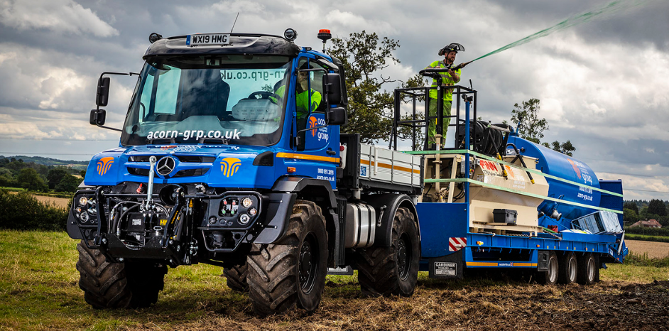 PLANTING TREES EFFICIENTLY WITH THE UNIMOG U 530 IMPLEMENT CARRIER.