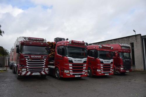 Kiron Owens' timber lorries lined up in yard